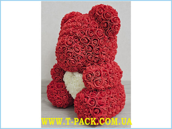 Red rose teddy bear with a heart