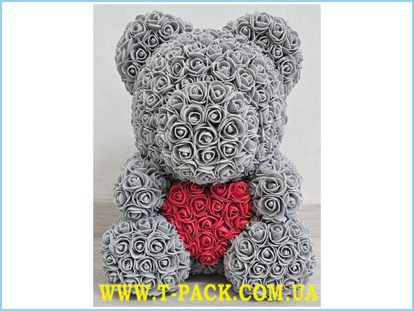 Gray rose teddy bear with a red heart