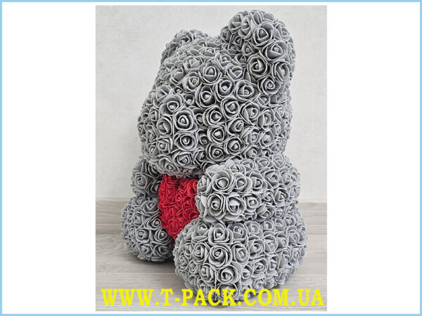 Gray rose teddy bear with a heart